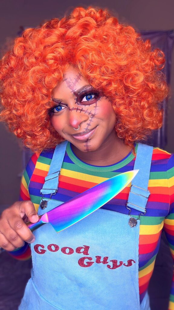 Black Cosplayer DeLa Doll dressed up as Chucky from the Child's Play series